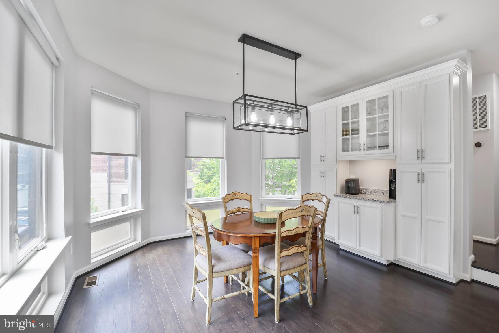 515 Riversail Lane, Unit 430 Oxon Hill, MD 20745 - Photo 9 of 54 a view of a dining room with furniture window and wooden floor