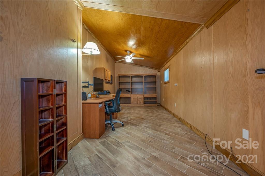 160 Fagan Drive Inman, SC 29349 - Photo 11 of 45 a view of walk in closet with clothes and shoes