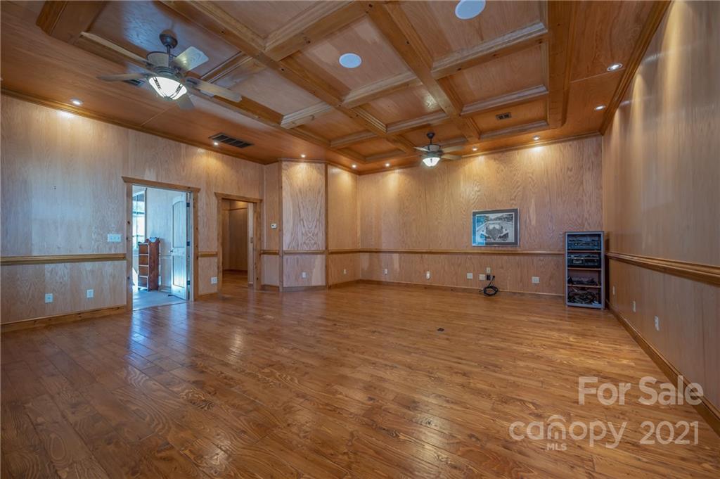 160 Fagan Drive Inman, SC 29349 - Photo 12 of 45 a view of a projector room with wooden floor