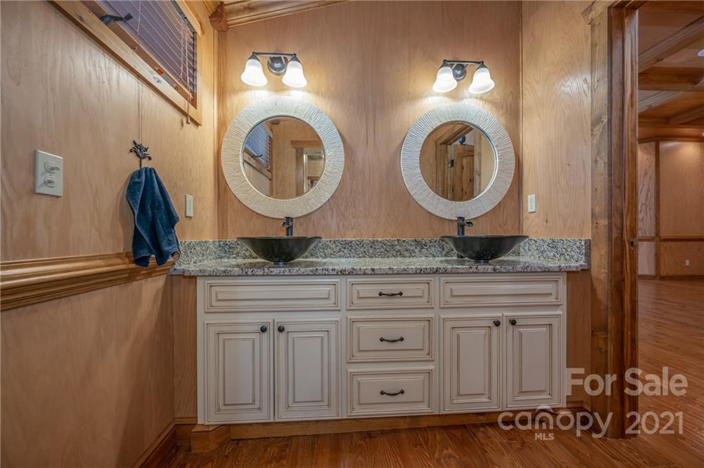 160 Fagan Drive Inman, SC 29349 - Photo 21 of 45 a bathroom with a granite countertop sink and a mirror