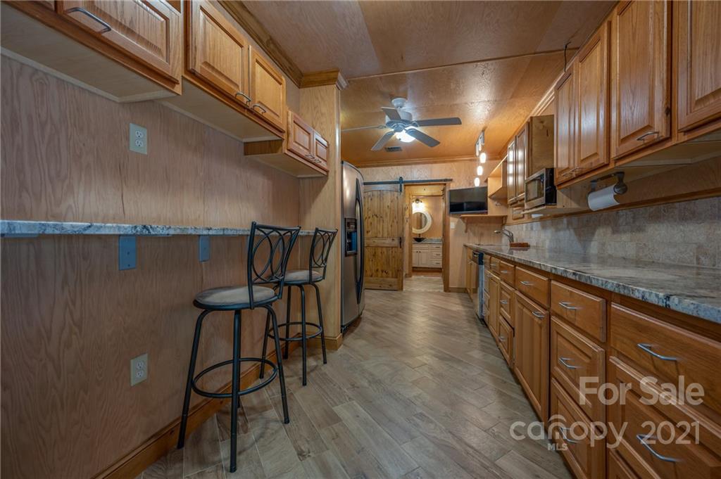 160 Fagan Drive Inman, SC 29349 - Photo 6 of 45 a kitchen with stainless steel appliances granite countertop a sink and cabinets