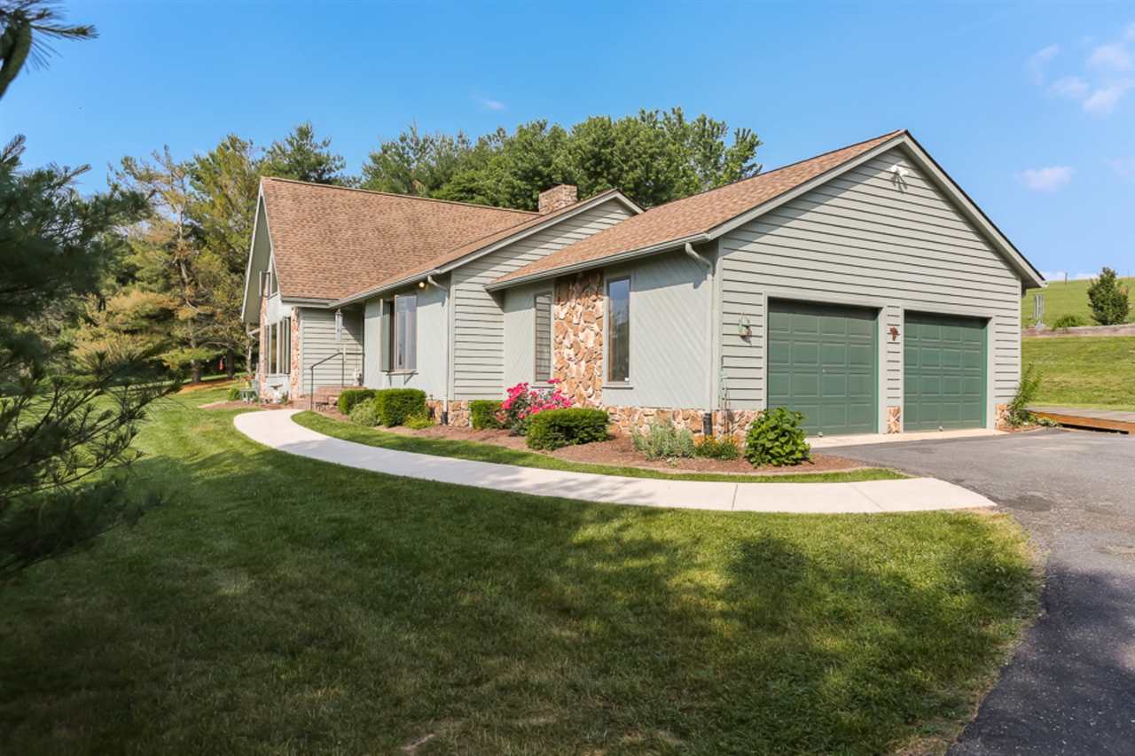 72 Greenfield Road Fishersville, VA 22939 - Photo 15 of 50 a front view of a house with a yard and garage