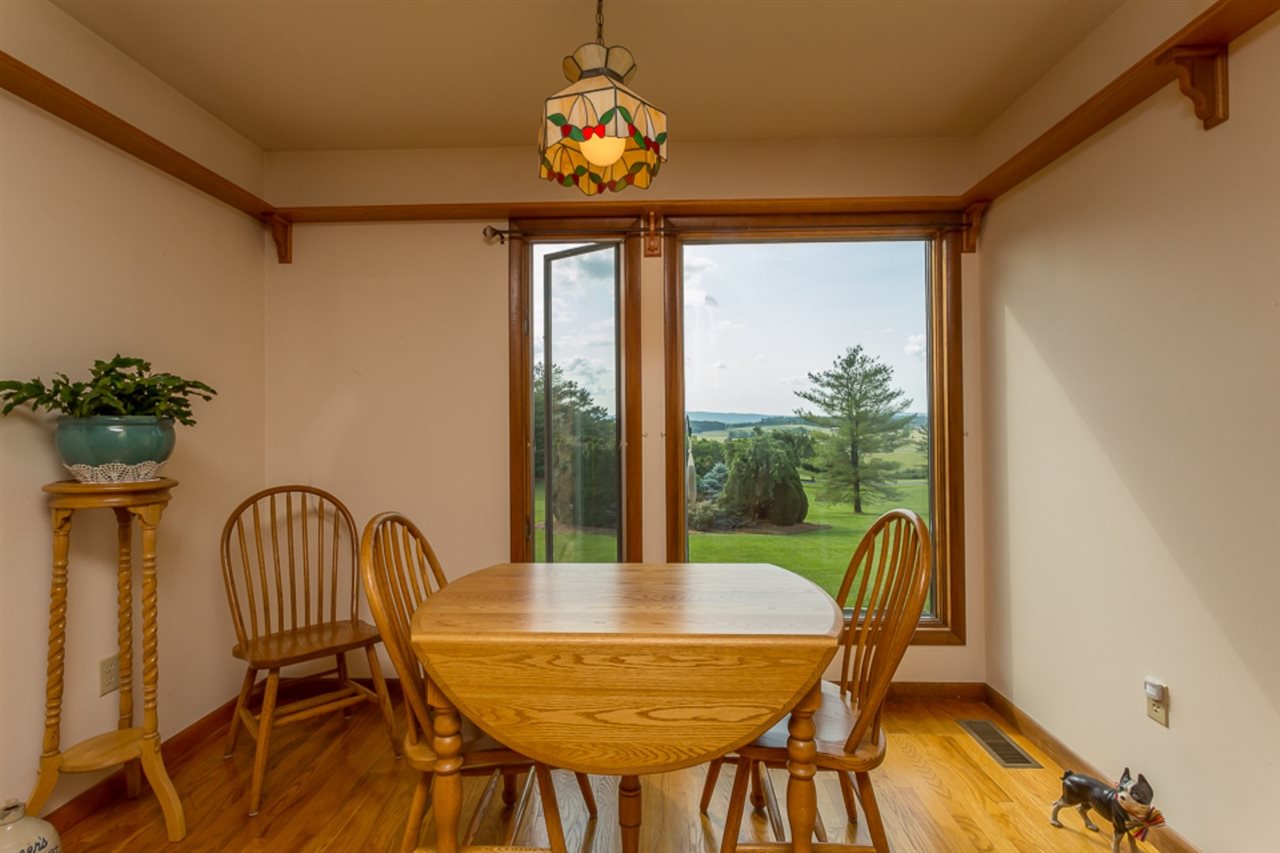 72 Greenfield Road Fishersville, VA 22939 - Photo 18 of 50 a view of a dining room with furniture window and wooden floor