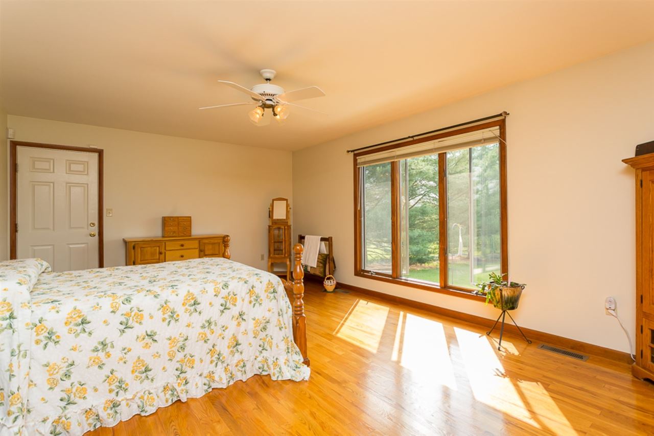 72 Greenfield Road Fishersville, VA 22939 - Photo 23 of 50 a bedroom with a bed and a large window