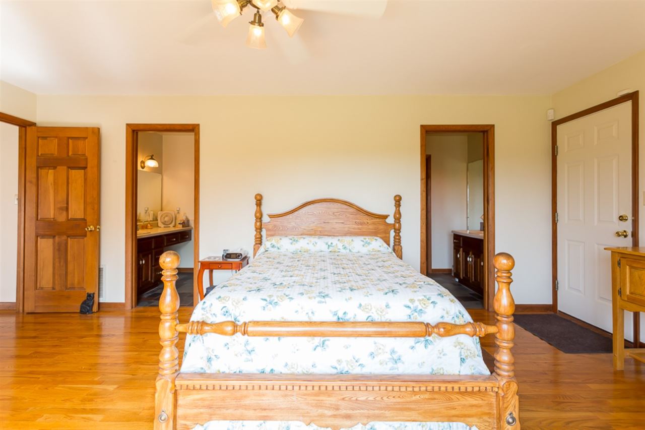 72 Greenfield Road Fishersville, VA 22939 - Photo 24 of 50 a spacious bedroom with a bed and a table