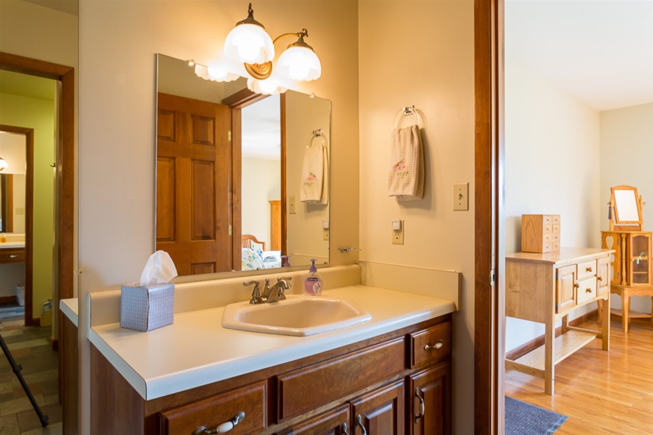 72 Greenfield Road Fishersville, VA 22939 - Photo 25 of 50 a bathroom with a sink and a mirror
