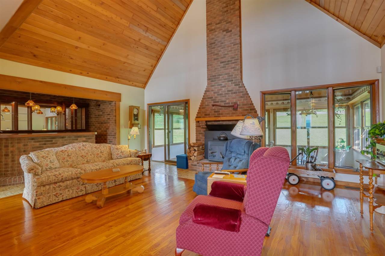 72 Greenfield Road Fishersville, VA 22939 - Photo 30 of 50 a living room with furniture fireplace and a table