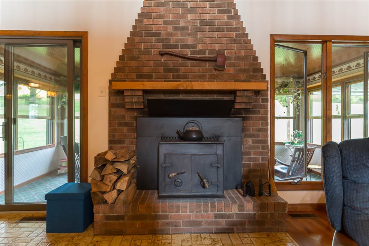 72 Greenfield Road Fishersville, VA 22939 - Photo 36 of 50 a living room with furniture and a fireplace