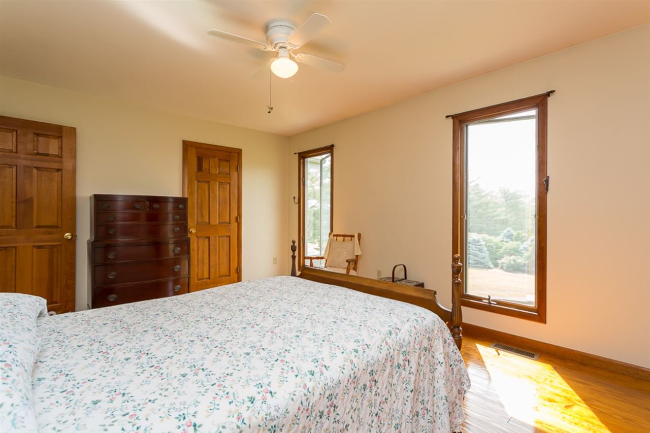 72 Greenfield Road Fishersville, VA 22939 - Photo 38 of 50 a bedroom with a bed dresser and a large window