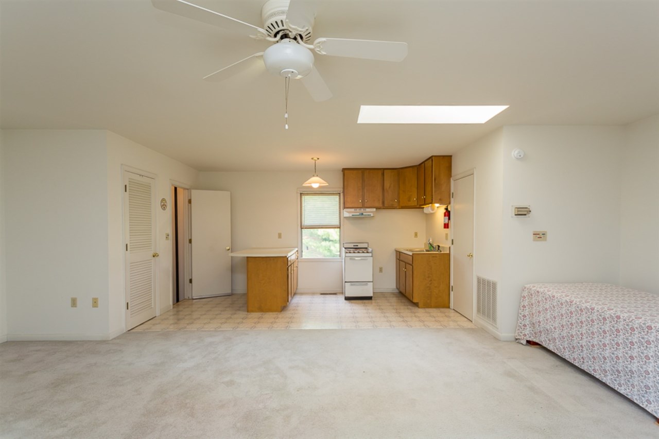 72 Greenfield Road Fishersville, VA 22939 - Photo 48 of 50 a view of a kitchen with furniture and a ceiling fan