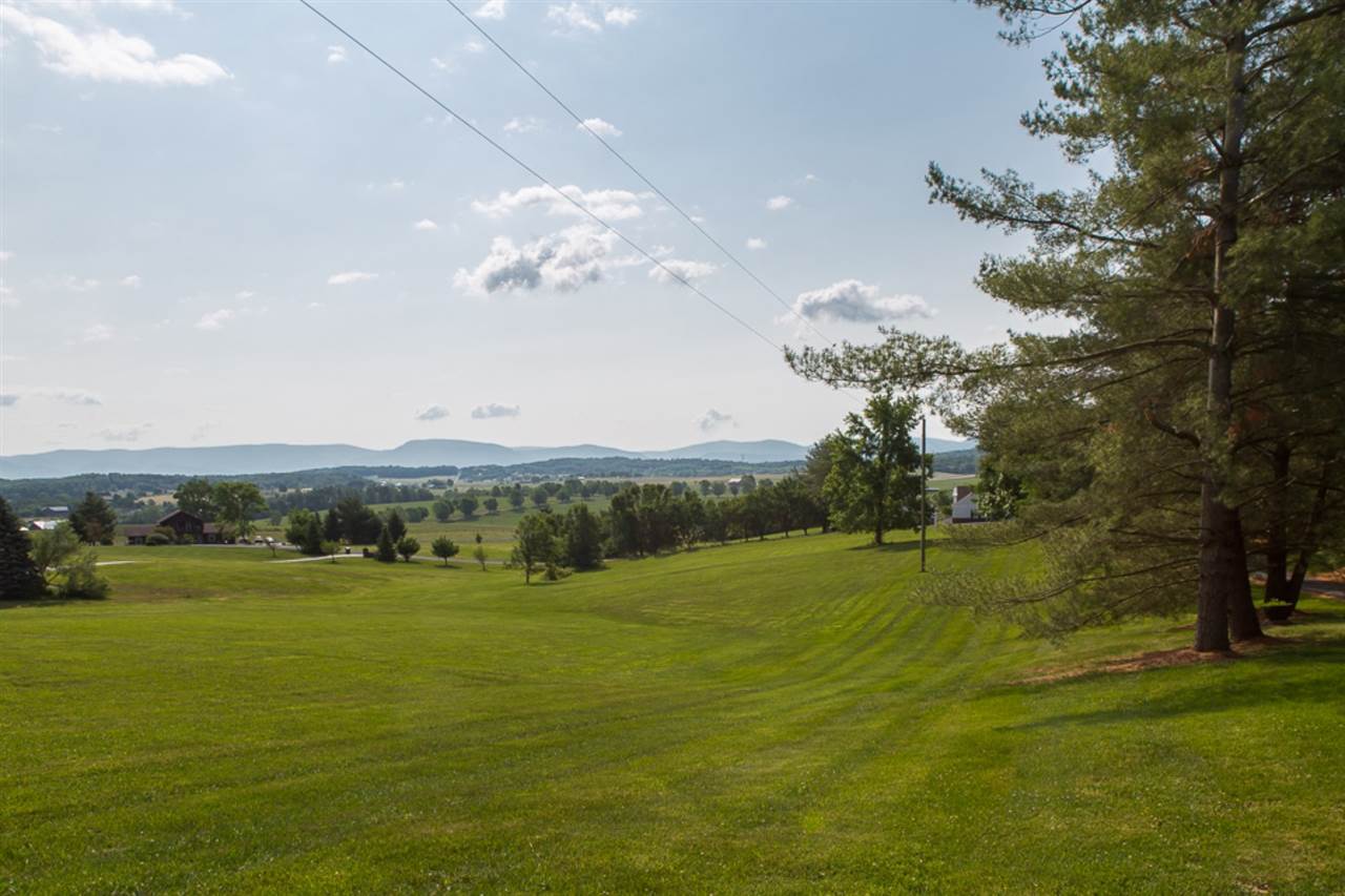 72 Greenfield Road Fishersville, VA 22939 - Photo 5 of 50 a view of a big yard with an outdoor space and seating