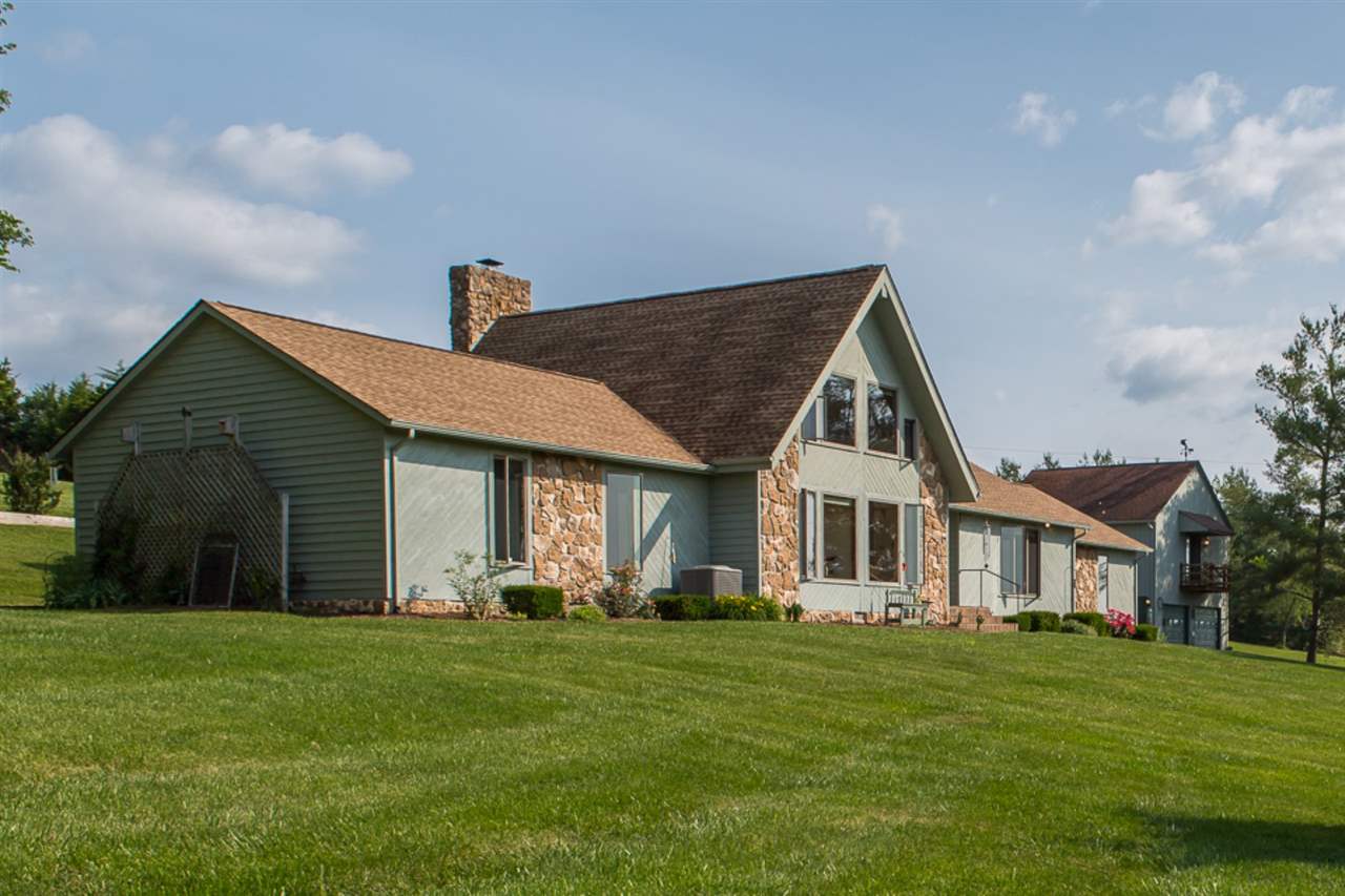 72 Greenfield Road Fishersville, VA 22939 - Photo 6 of 50 a front view of a house with a garden and porch
