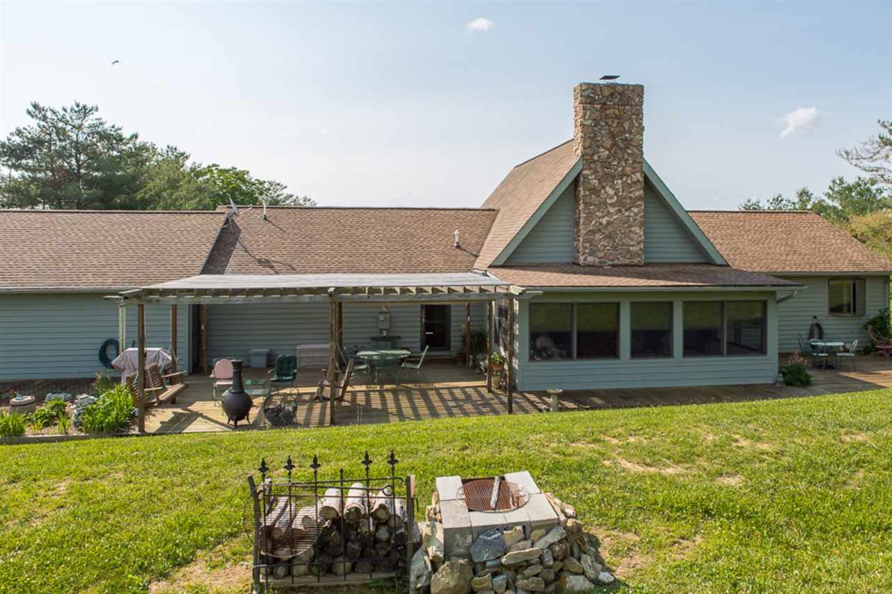 72 Greenfield Road Fishersville, VA 22939 - Photo 10 of 50 a front view of a house with swimming pool garden and patio