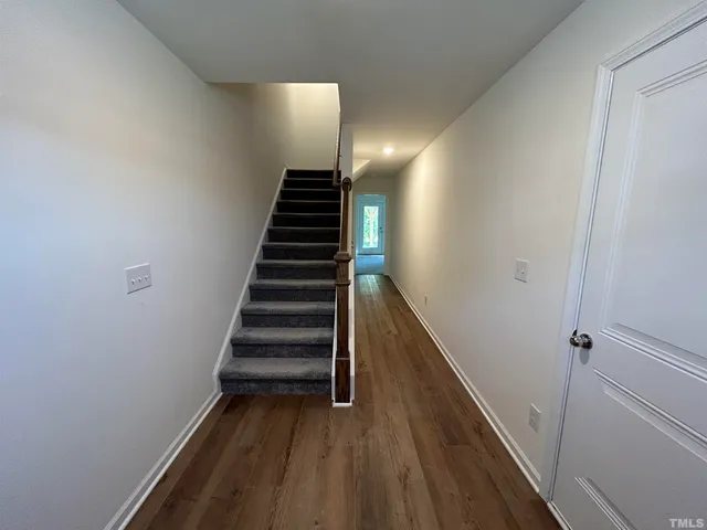 a view of entryway with wooden floor
