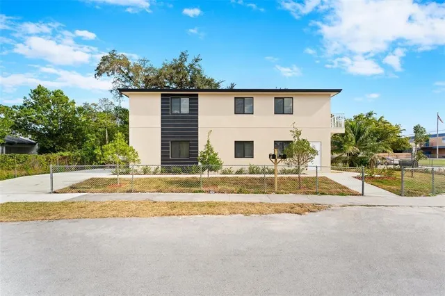 a view of a house with a swimming pool
