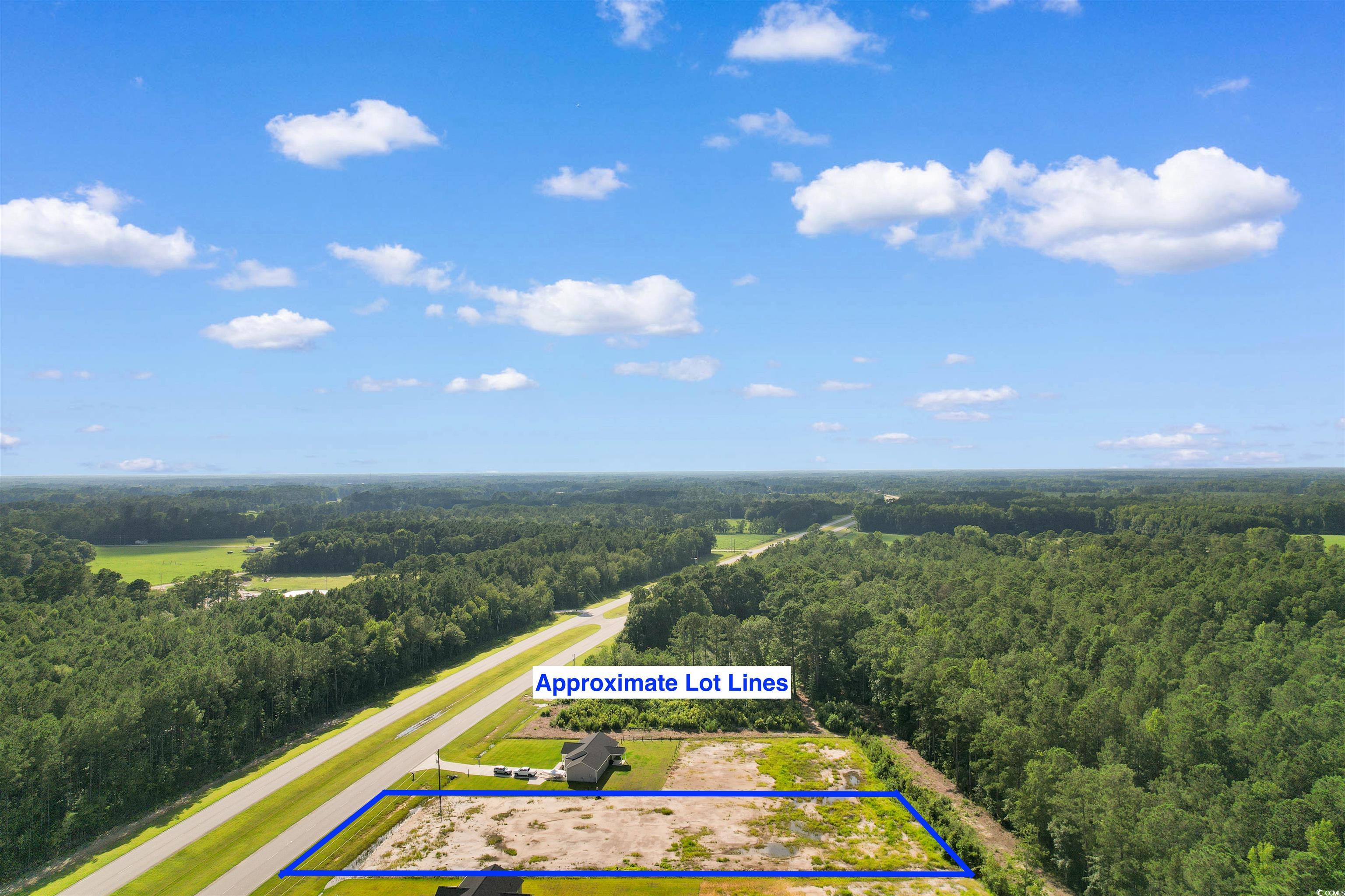 9 Loris Sc 29569 Loris, SC 29569 - Photo 11 of 20 Aerial view of property and surrounding area featuring a forest and property parcel outlined