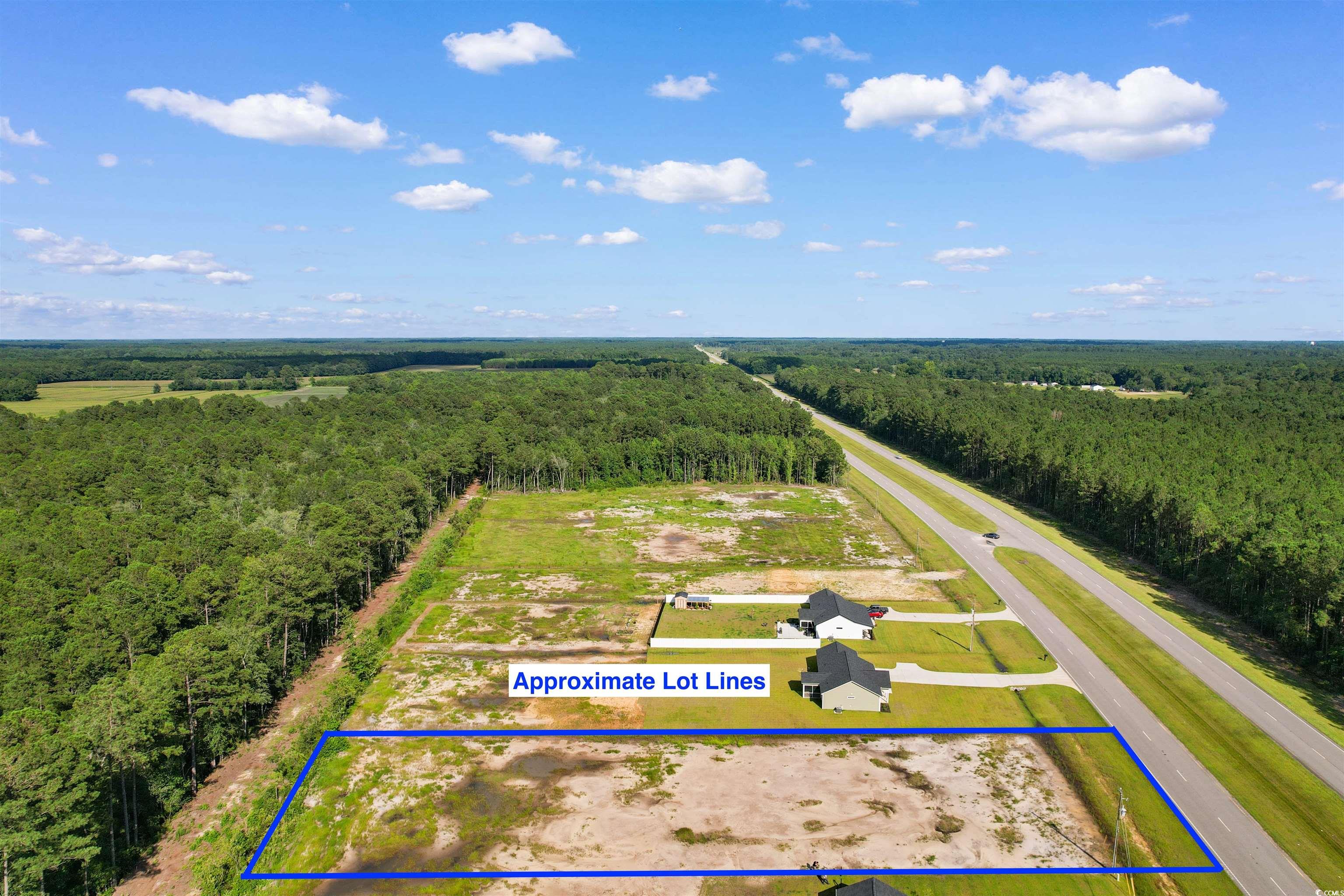 9 Loris Sc 29569 Loris, SC 29569 - Photo 3 of 20 Overview of rural landscape featuring a heavily wooded area and property parcel outlined