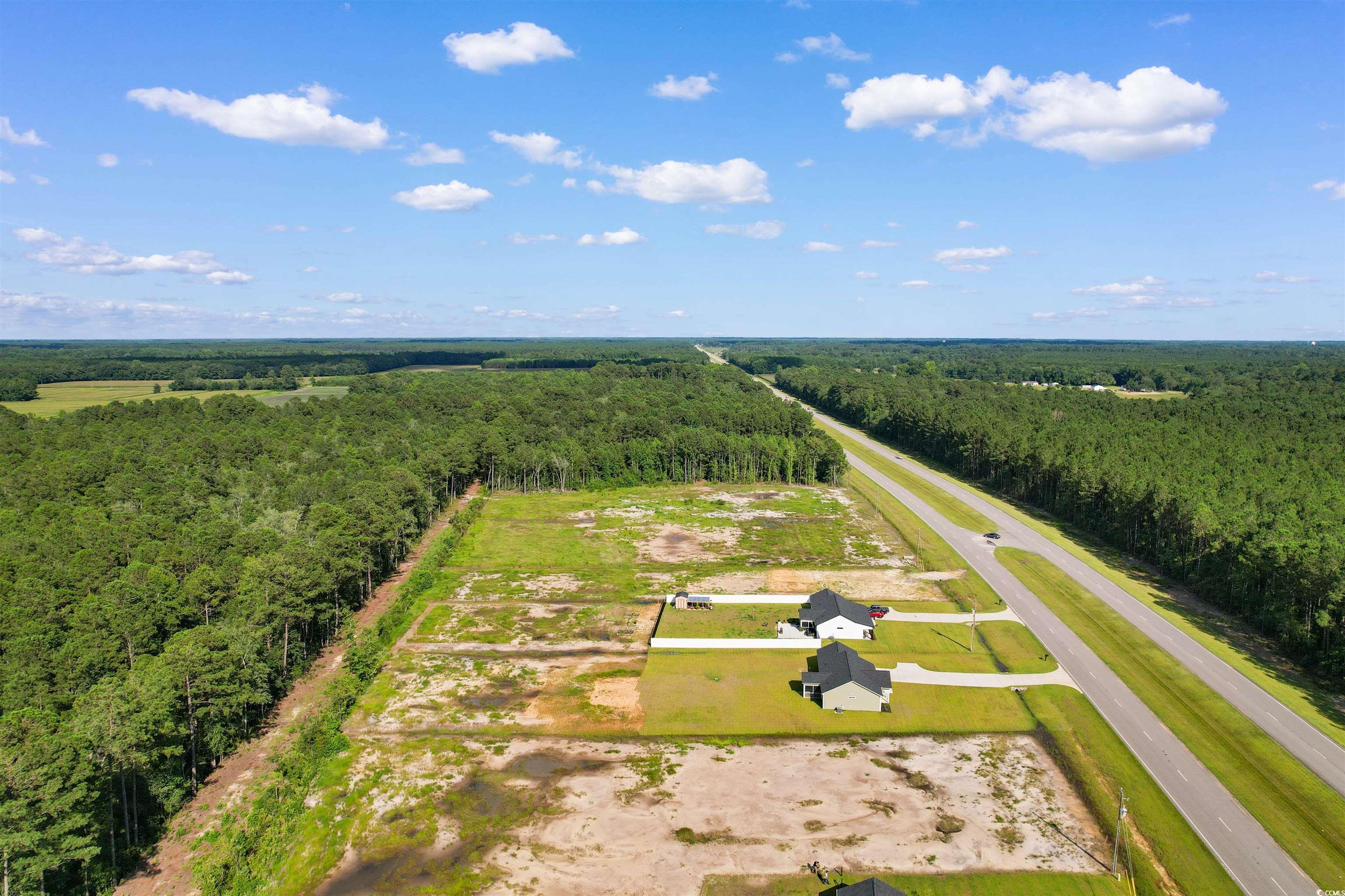 9 Loris Sc 29569 Loris, SC 29569 - Photo 4 of 20 View of rural area with a heavily wooded area
