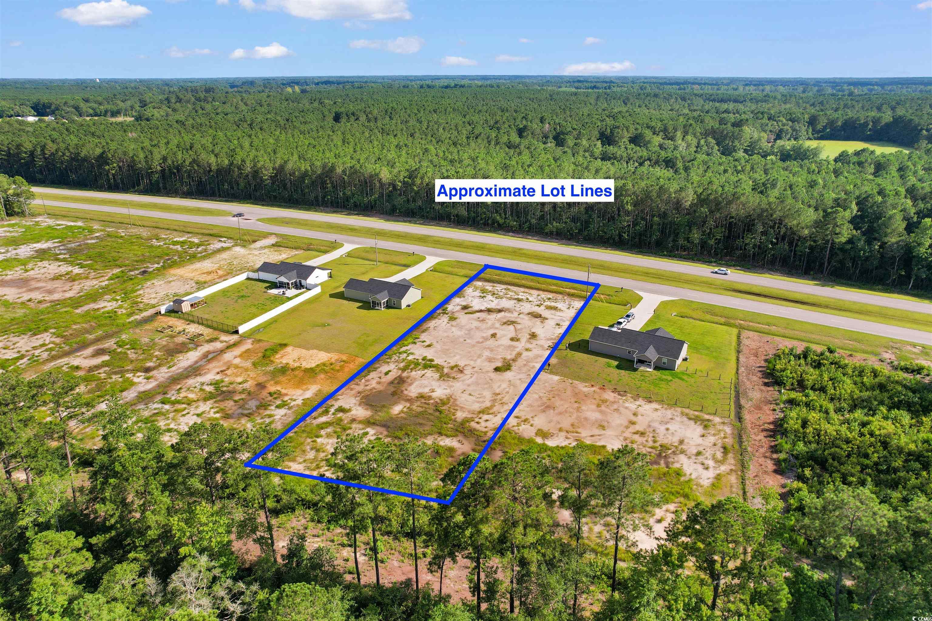 9 Loris Sc 29569 Loris, SC 29569 - Photo 5 of 20 Aerial overview of property's location with a forest and property parcel outlined