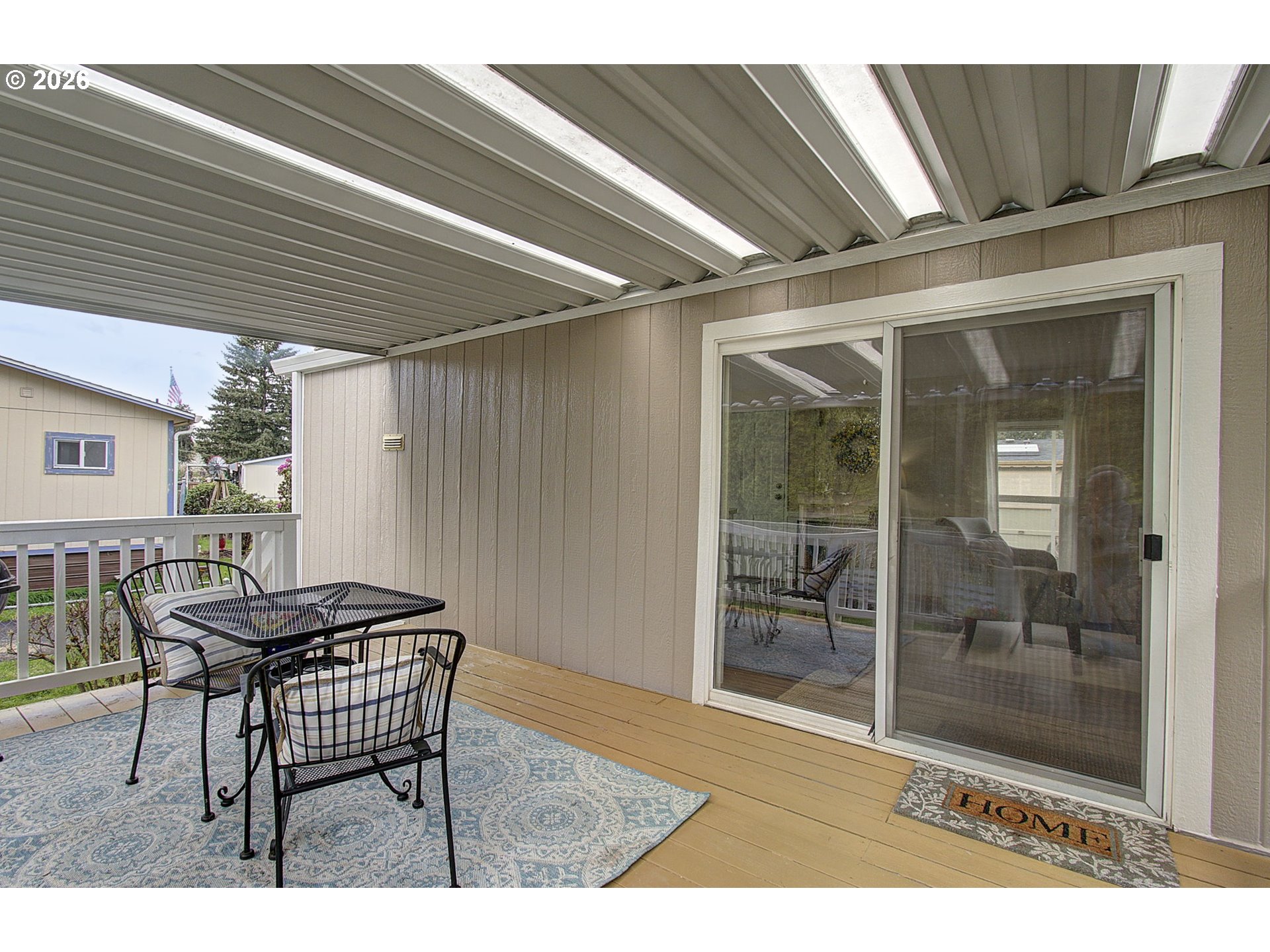 15619 Northeast Caples Road, Unit 150 Brush Prairie, WA 98606 - Photo 27 of 28 a dining room with furniture and window