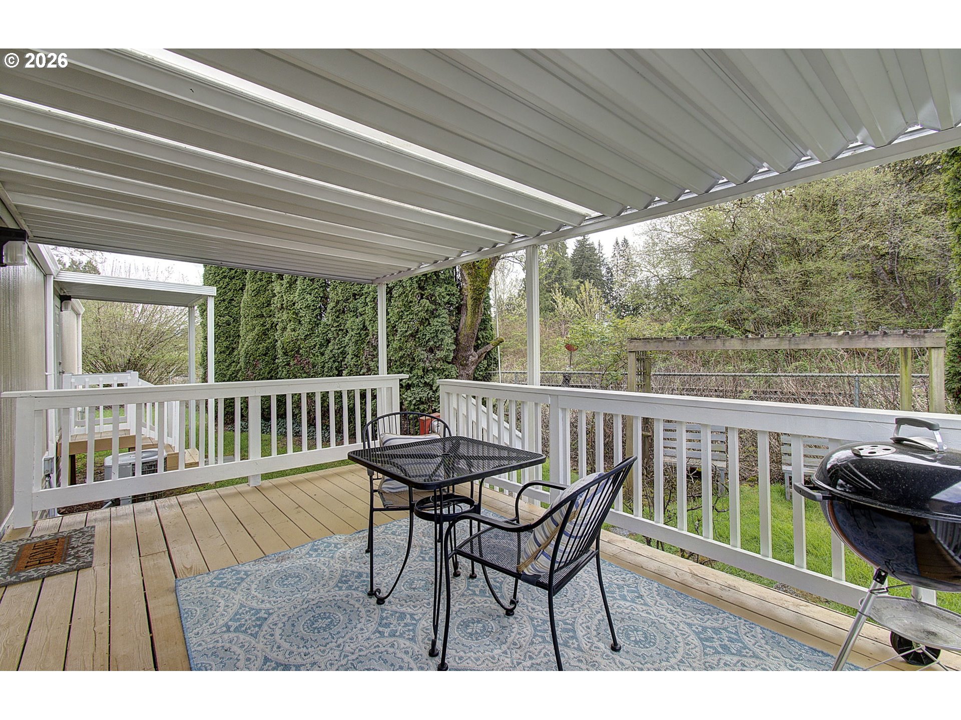 15619 Northeast Caples Road, Unit 150 Brush Prairie, WA 98606 - Photo 28 of 28 a view of a patio on the deck