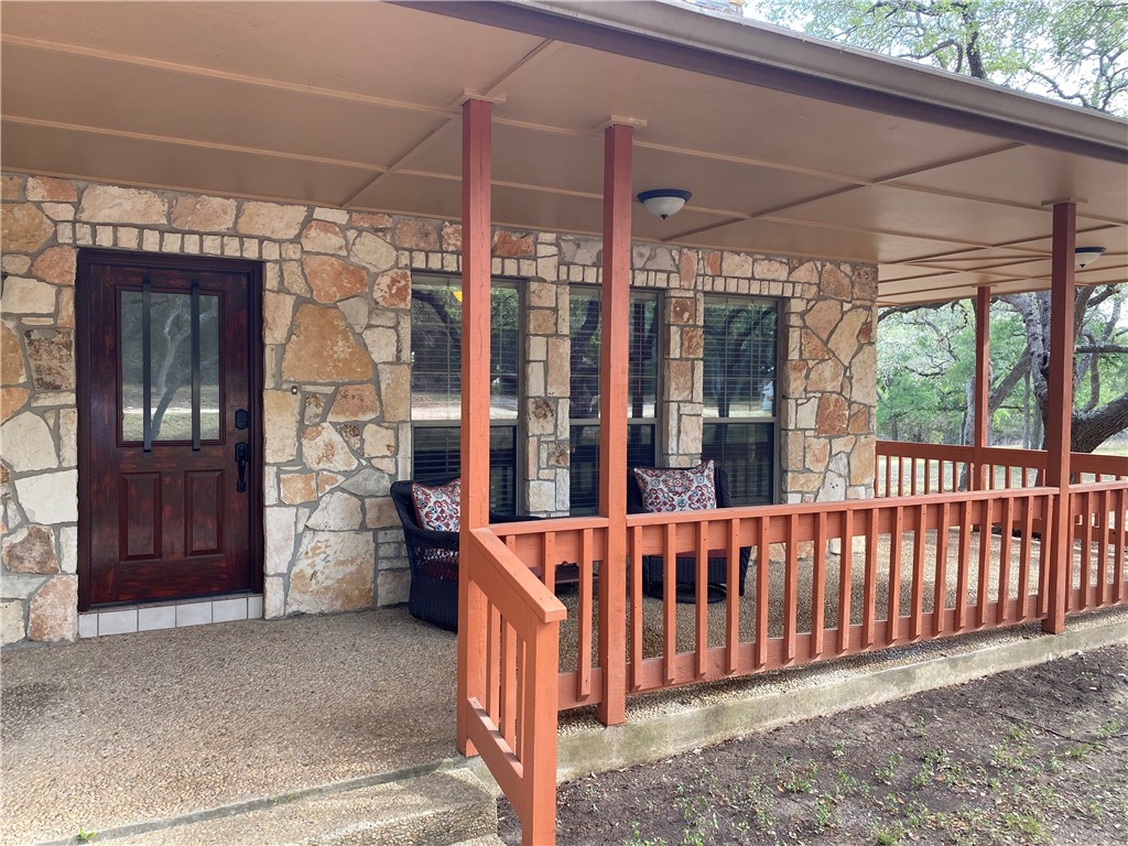 a front view of a house with a porch