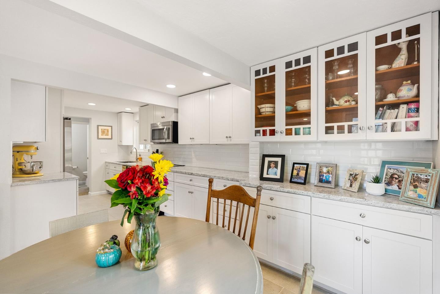 165 Bar Harbor Court Aptos, CA 95003 - Photo 11 of 37 a kitchen with a refrigerator and a white cabinets