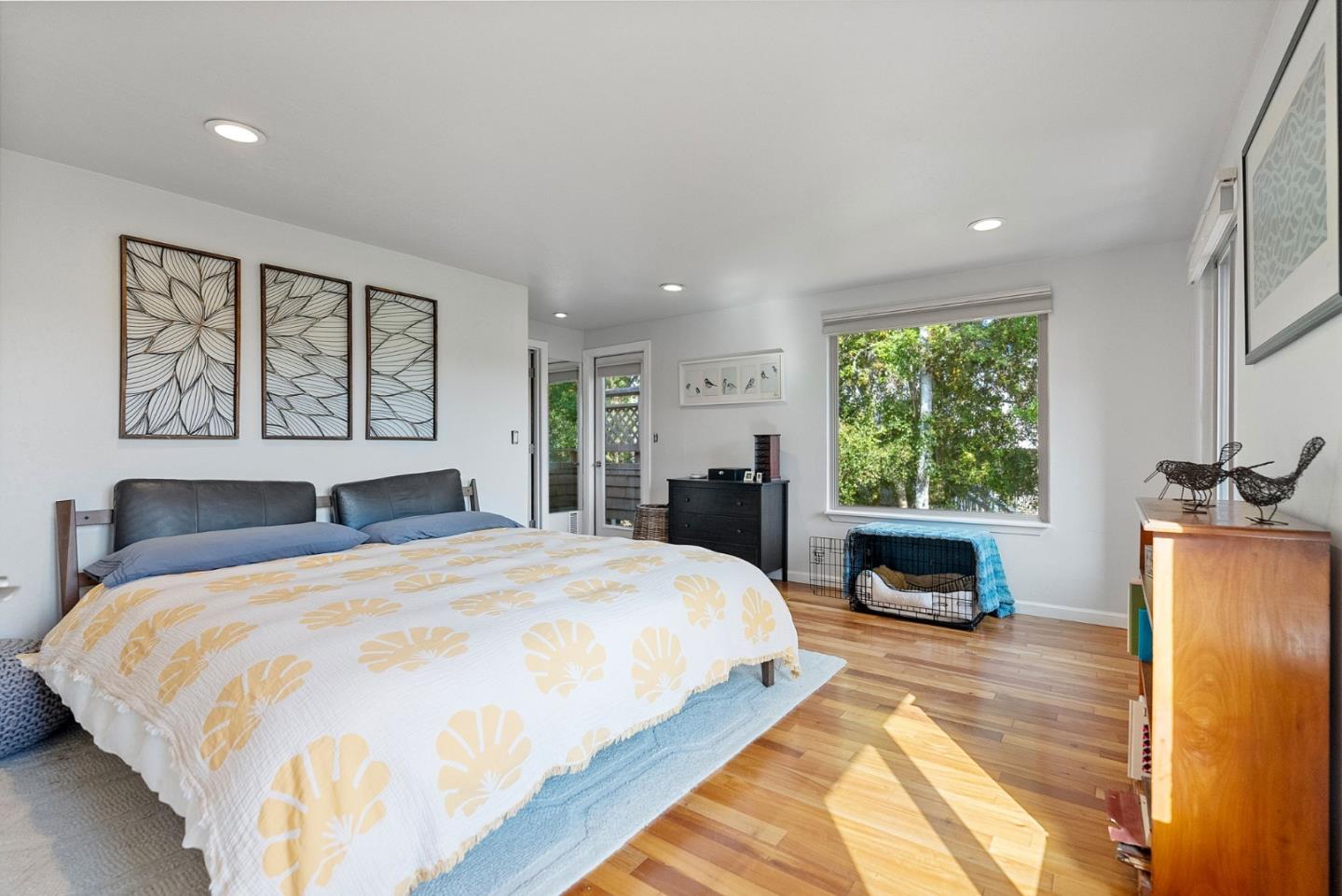 165 Bar Harbor Court Aptos, CA 95003 - Photo 18 of 37 a spacious bedroom with a bed and a large window