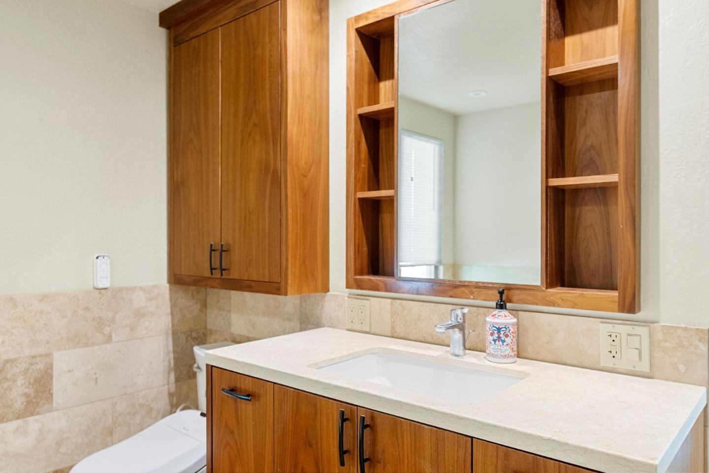 165 Bar Harbor Court Aptos, CA 95003 - Photo 22 of 37 a bathroom with a sink and a mirror