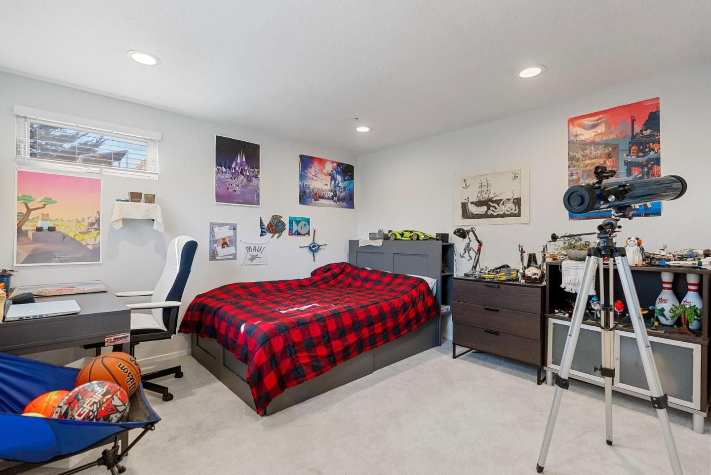 165 Bar Harbor Court Aptos, CA 95003 - Photo 24 of 37 a bedroom with a bed and a bookshelf