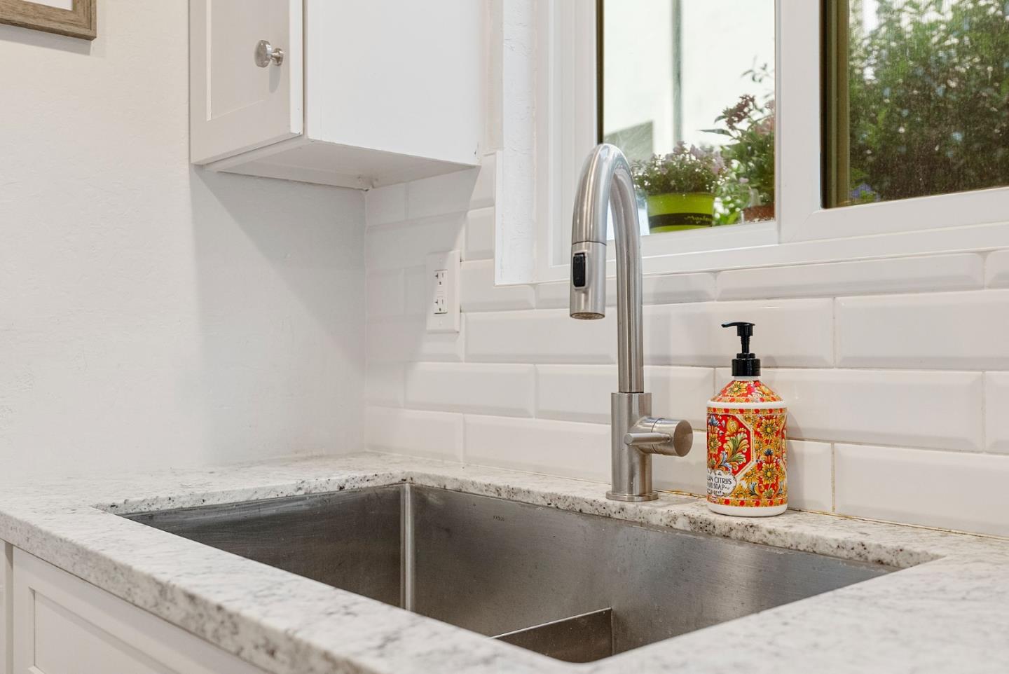 165 Bar Harbor Court Aptos, CA 95003 - Photo 9 of 37 a kitchen with a sink and a window