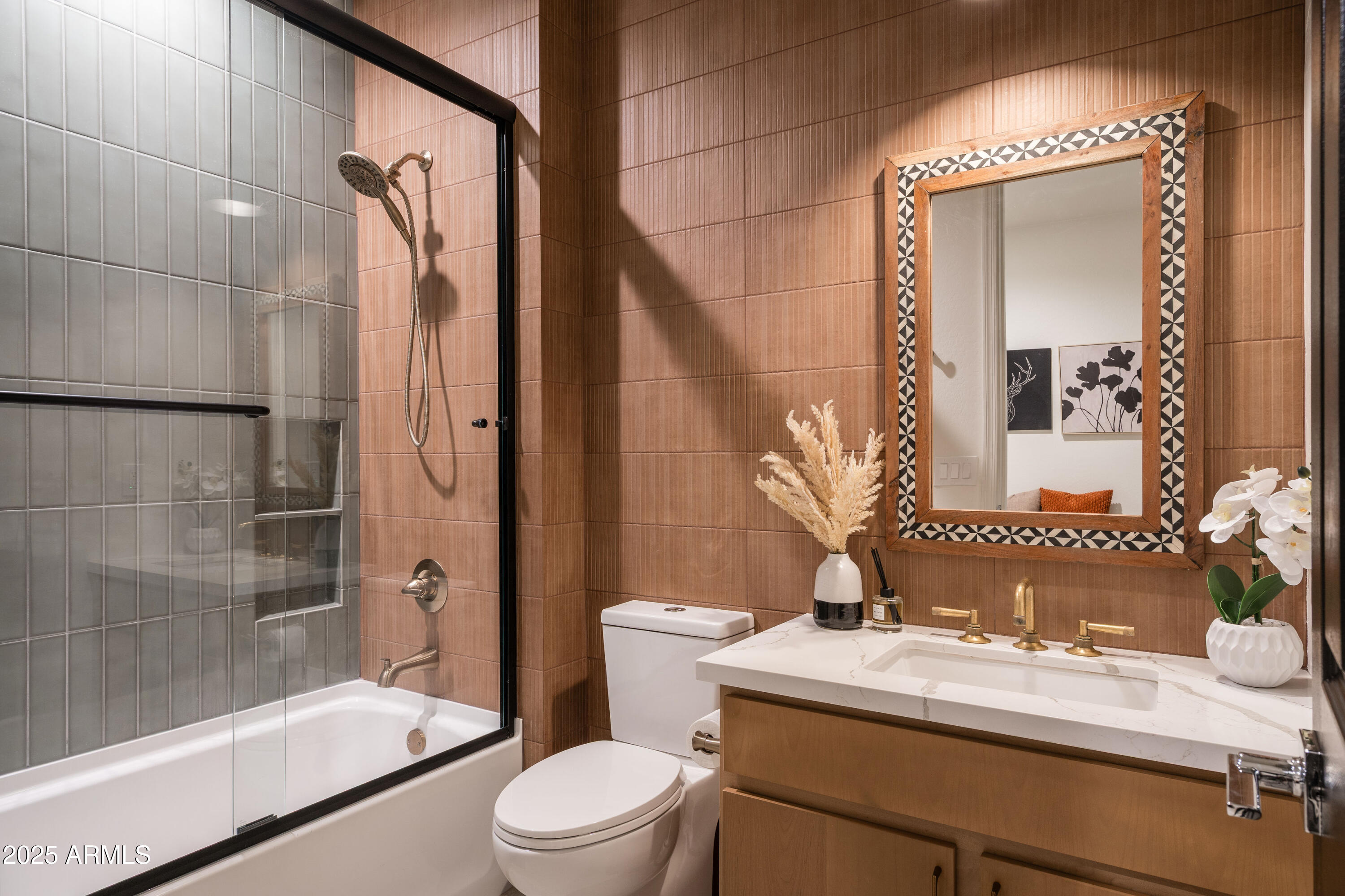 18365 West Ewers Drive Surprise, AZ 85374 - Photo 13 of 18 a bathroom with a sink and a mirror