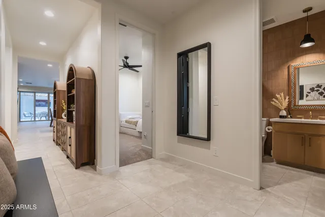 a view of a kitchen with a refrigerator and a stove