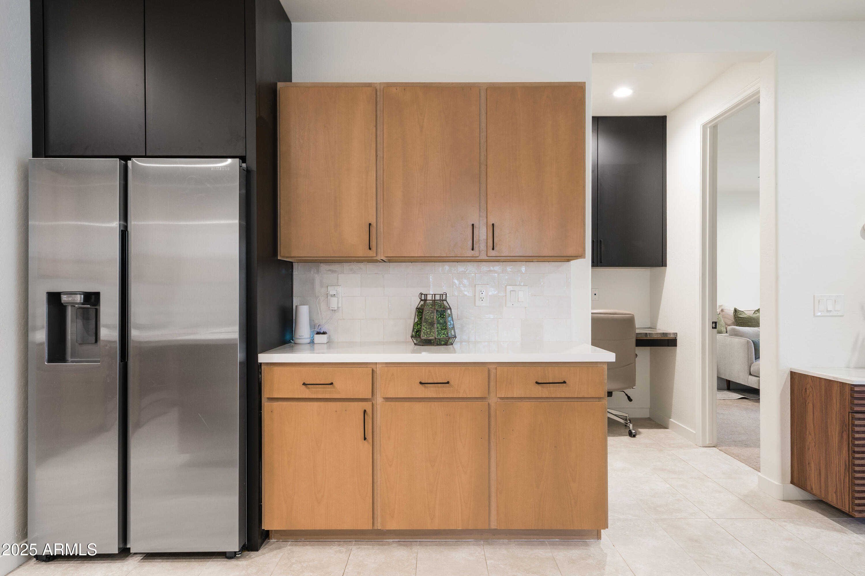 18365 West Ewers Drive Surprise, AZ 85374 - Photo 7 of 18 a kitchen with cabinets and stainless steel appliances