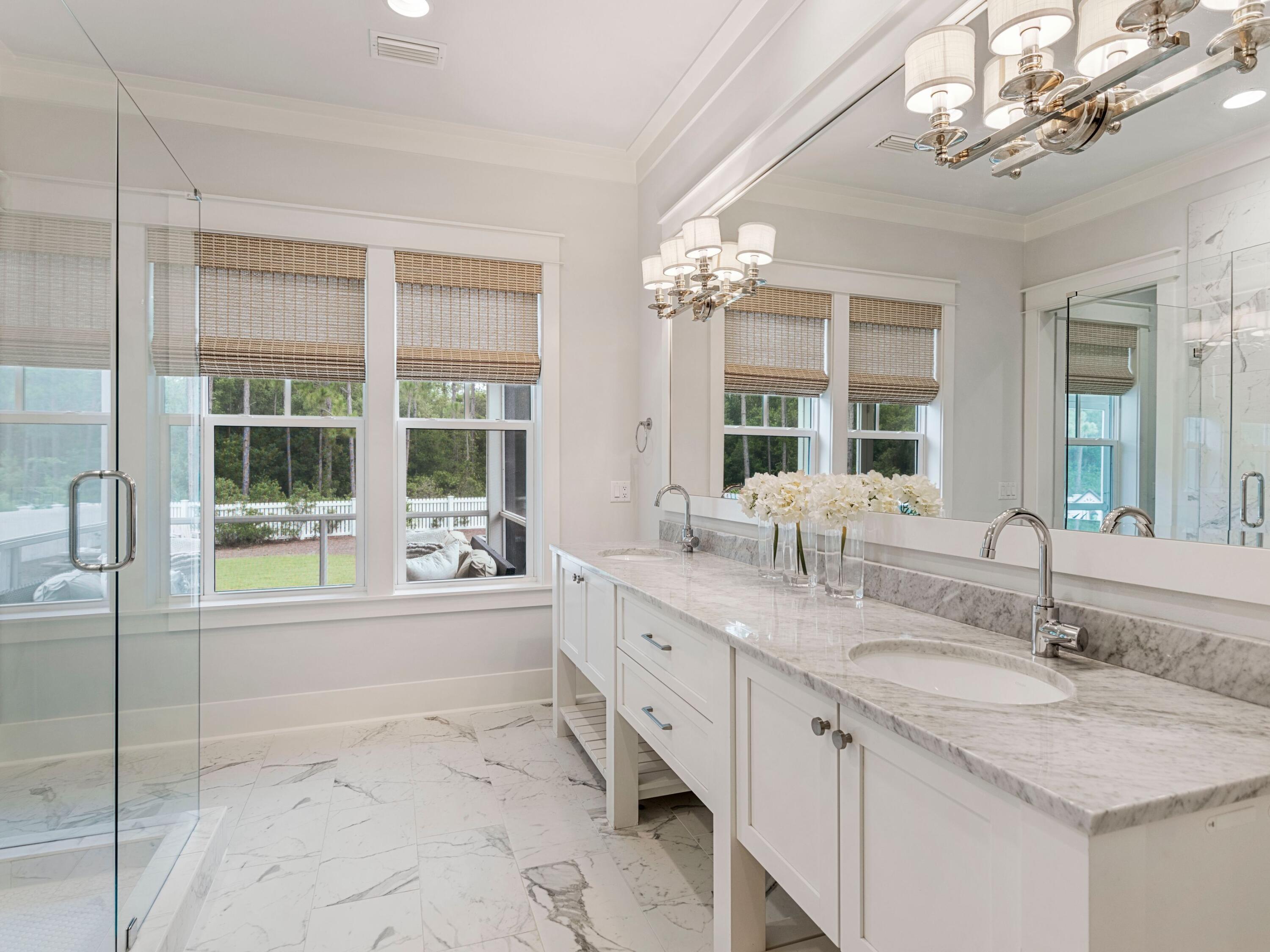 193 Splash Drive Inlet Beach, FL 32461 - Photo 21 of 43 a bathroom with a granite countertop sink and a large mirror