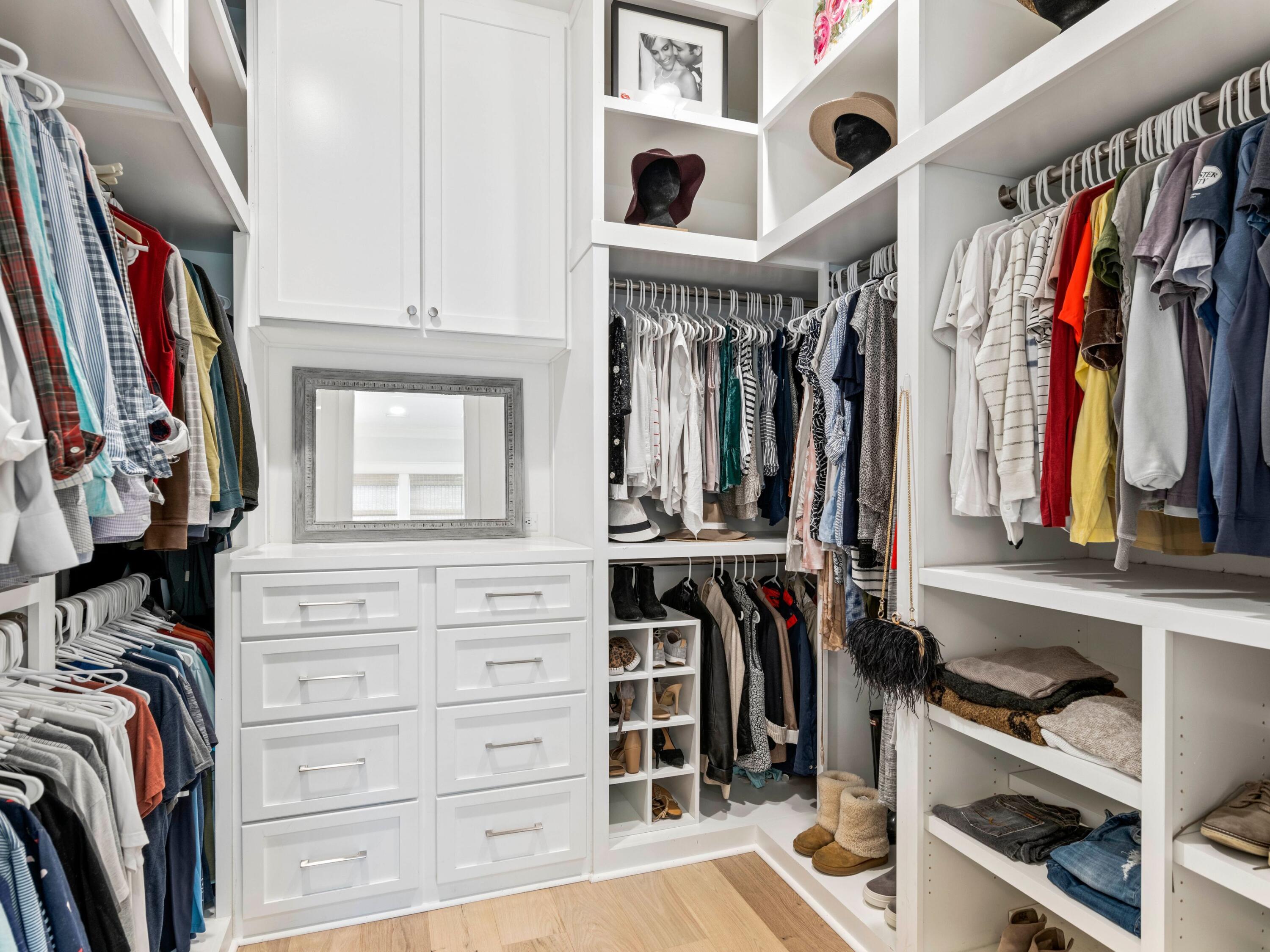 193 Splash Drive Inlet Beach, FL 32461 - Photo 23 of 43 a view of walk in closet with clothes and shoes