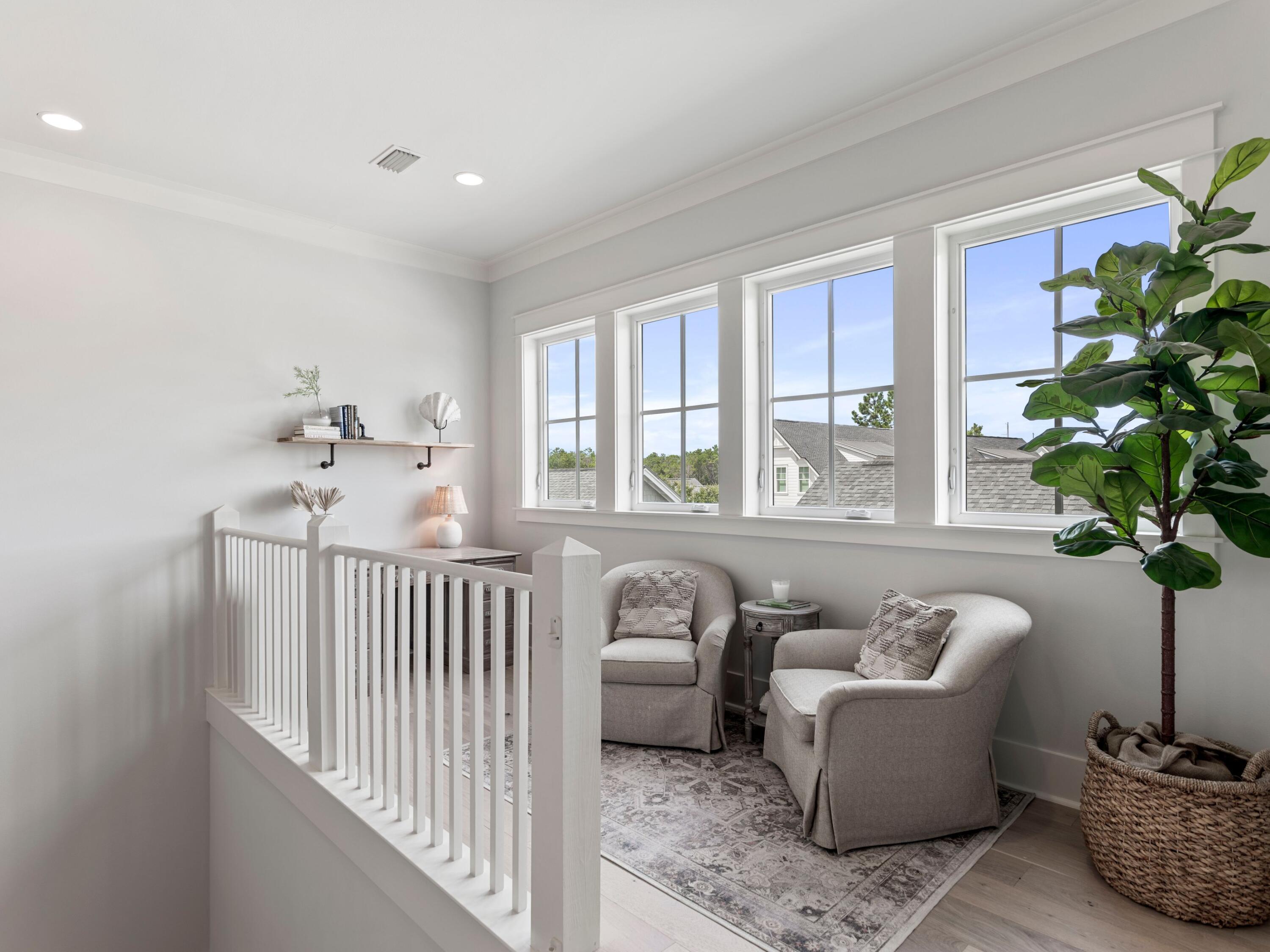 193 Splash Drive Inlet Beach, FL 32461 - Photo 26 of 43 a living room with furniture and a potted plant