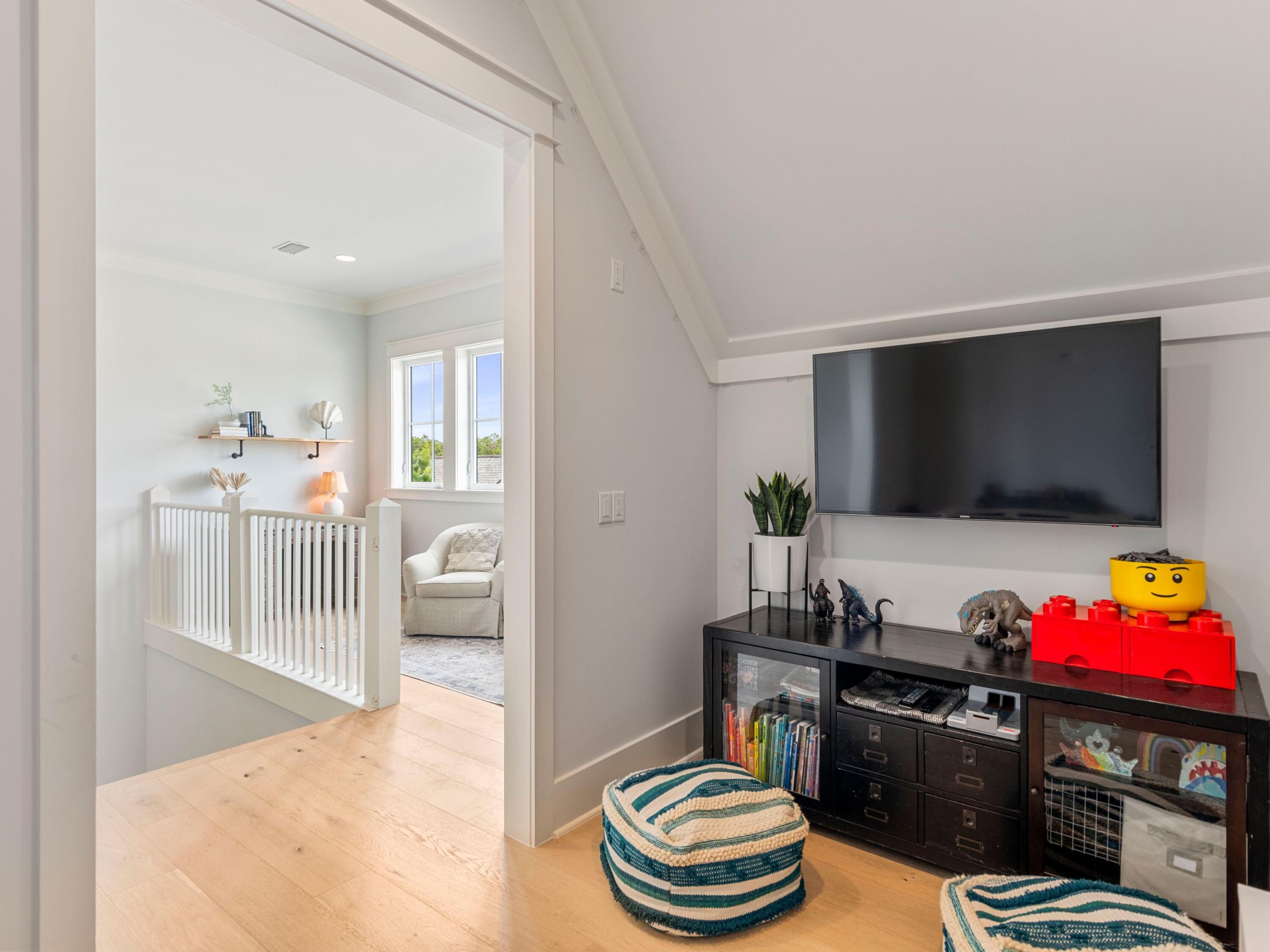 193 Splash Drive Inlet Beach, FL 32461 - Photo 28 of 43 a living room with furniture and a flat screen tv