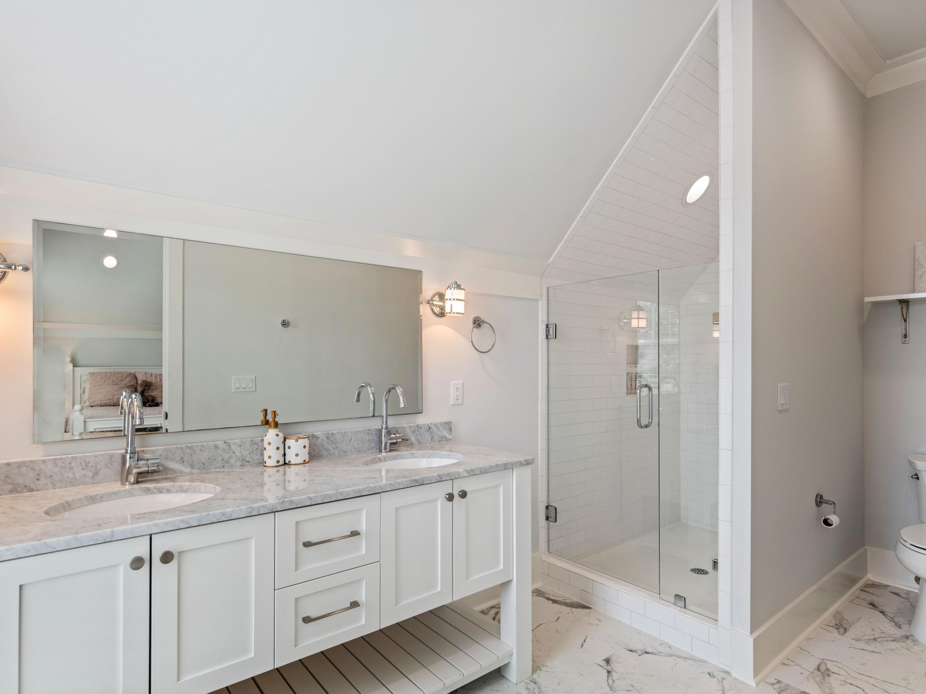 193 Splash Drive Inlet Beach, FL 32461 - Photo 38 of 43 a bathroom with double sink and a mirror