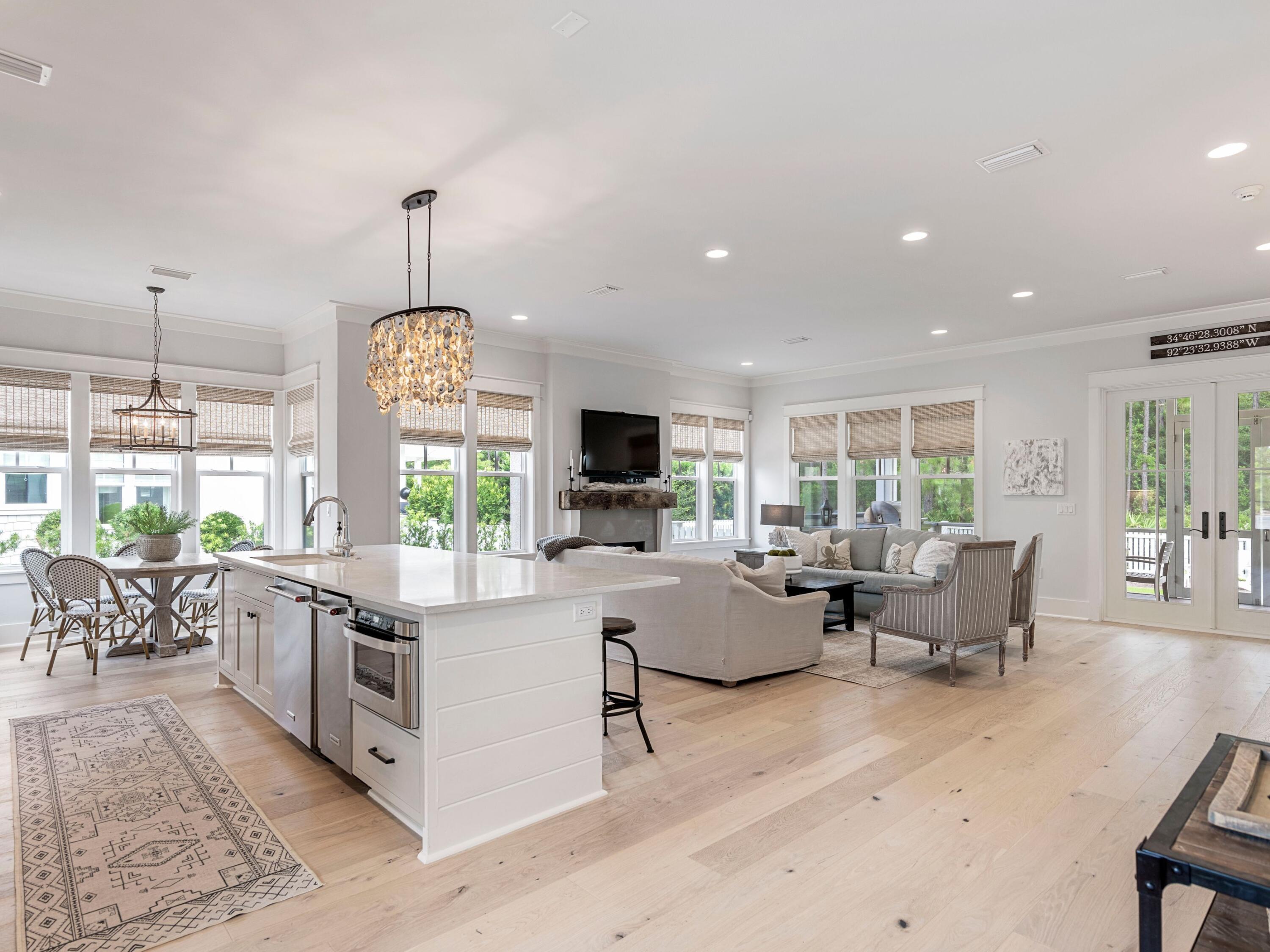 193 Splash Drive Inlet Beach, FL 32461 - Photo 7 of 43 a living room with furniture flat screen tv and a large window