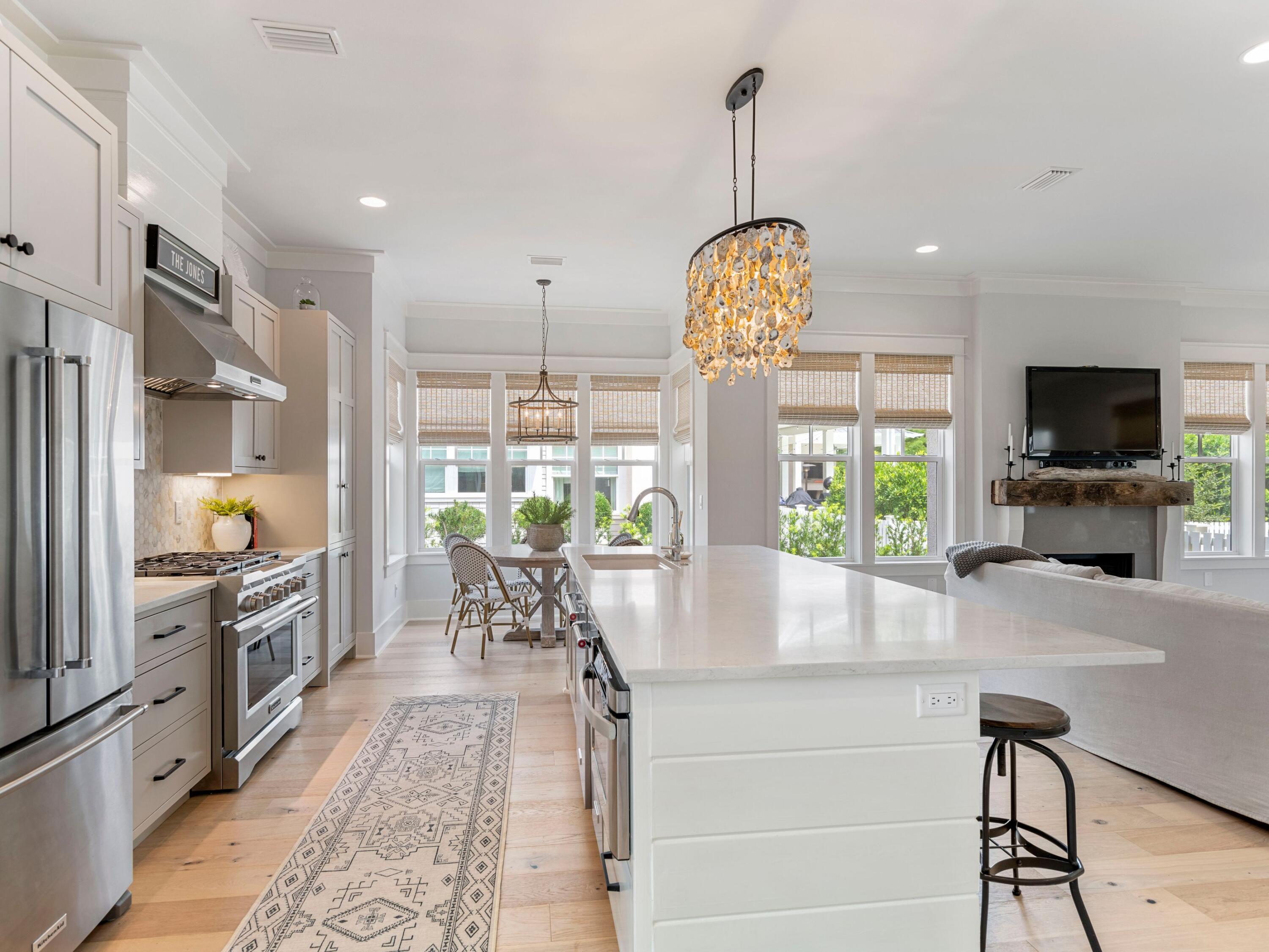 193 Splash Drive Inlet Beach, FL 32461 - Photo 10 of 43 a view of a kitchen with furniture window and wooden floor