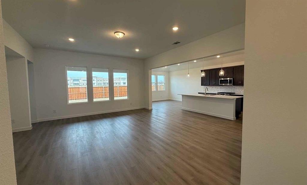 1216 Watercrest Street Forney, TX 75126 - Photo 11 of 24 Open Kitchen-Living-Dining Room Construction Progress