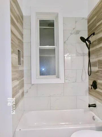 a bathroom with a bathtub