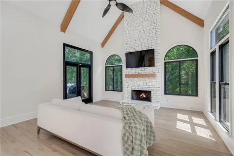 a view of a fireplace with wooden floor