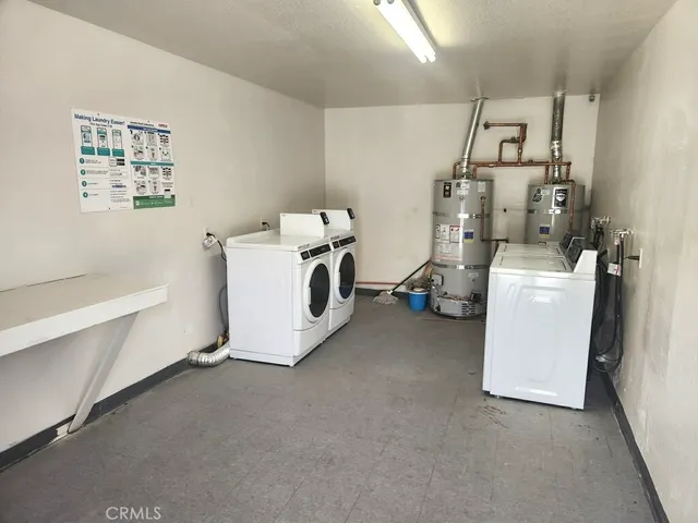 a utility room with a washer and dryer