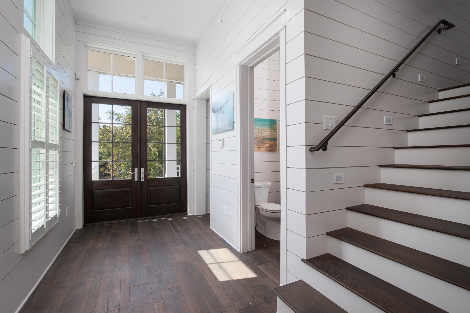 446 Morgans Trail Santa Rosa Beach, FL 32459 - Photo 26 of 49 a view of entryway with stairs and wooden floor