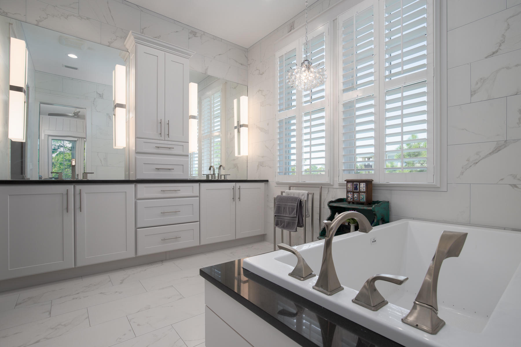 446 Morgans Trail Santa Rosa Beach, FL 32459 - Photo 29 of 49 a kitchen with a table chairs and cabinets