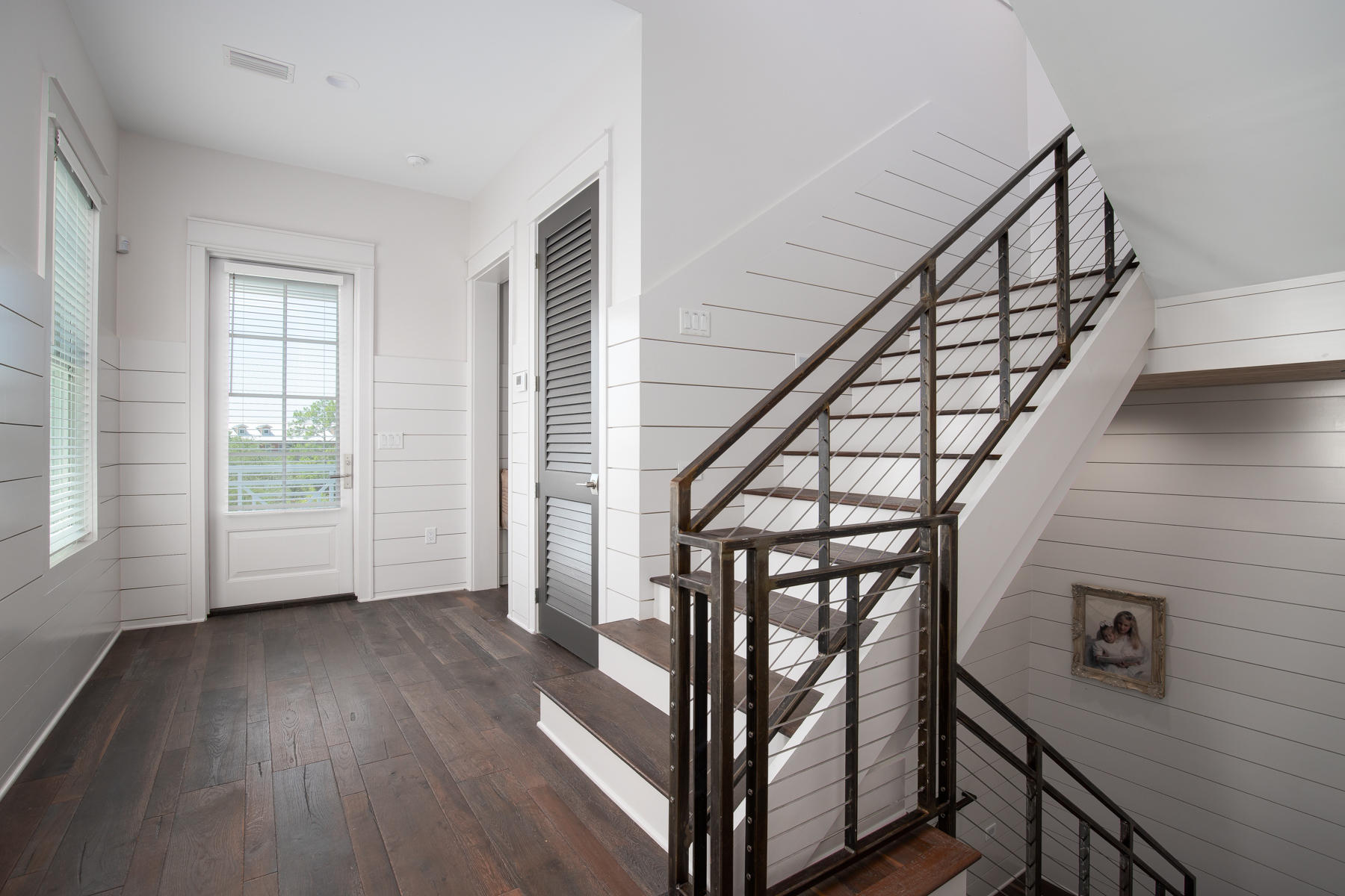 446 Morgans Trail Santa Rosa Beach, FL 32459 - Photo 37 of 49 a view of entryway with wooden floor and stairs