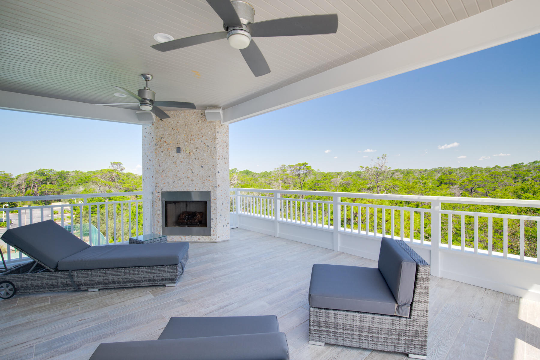 446 Morgans Trail Santa Rosa Beach, FL 32459 - Photo 44 of 49 a balcony with furniture and a fireplace