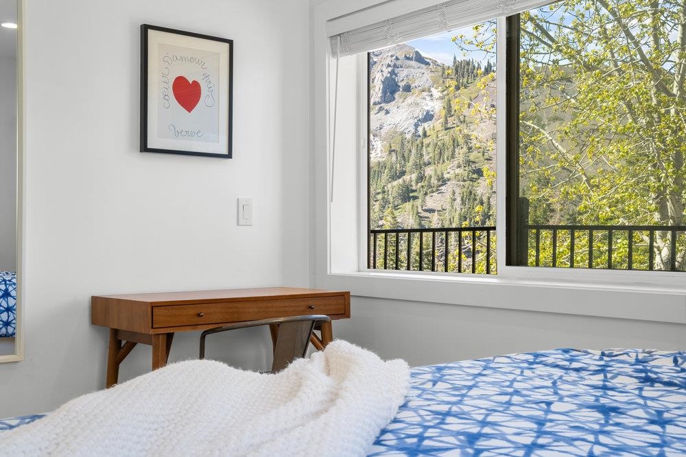2090 Chalet Road, Unit 4 Alpine Meadows, CA 96146 - Photo 12 of 28 a bedroom with a bed and a window
